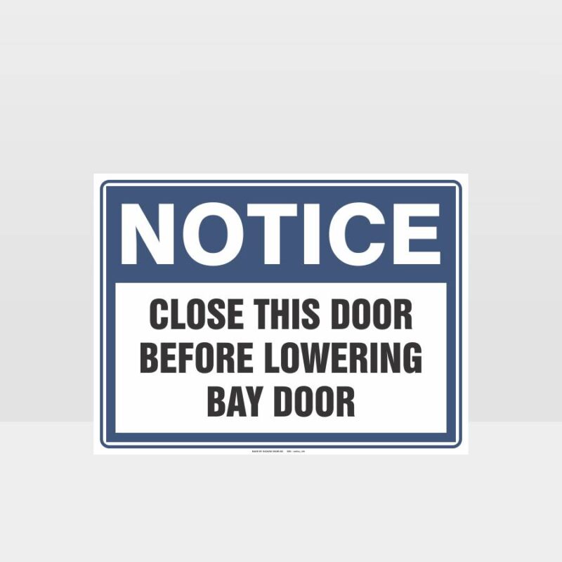 Close This Door Before Lowering Bay Door Sign